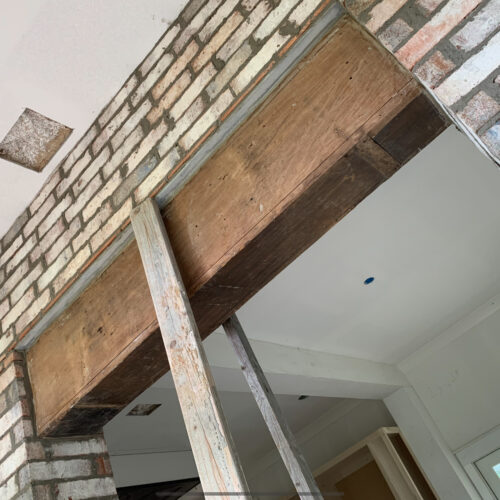 Antique Grandfather Clock as a Foyer Beam